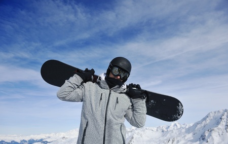 young athlete man have fun during skiing sport on hi mountain slopes at winter seasson and sunny dayの写真素材