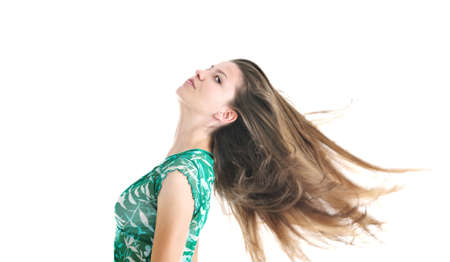 beautiful young woman in fashion clothes isolated on white backgroundの写真素材