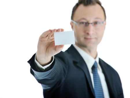 portrait of young businessman with empty business card isolated on white background の写真素材