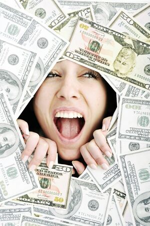 happy young business woman isolated on white playing with dollars money and representing success in...