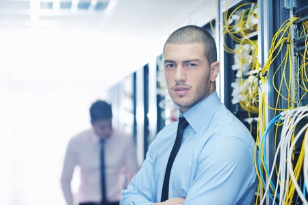 group of young business people it engineer in network server room solving problems and give help and supportの写真素材