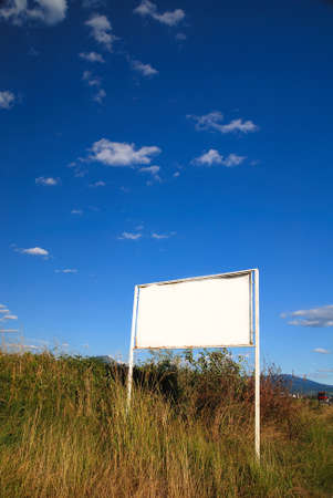 metal sign in grassの写真素材