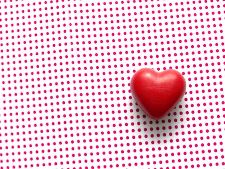heart on dotted backgroundの写真素材