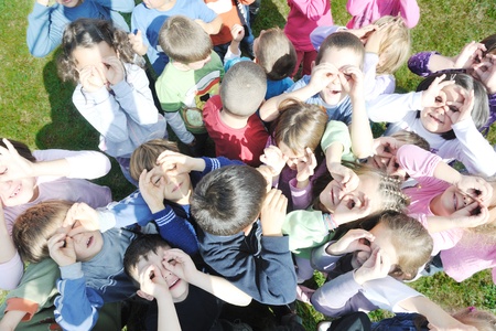happy child kids group have fun and play at kindergarden preschool education concept with  teacherの写真素材