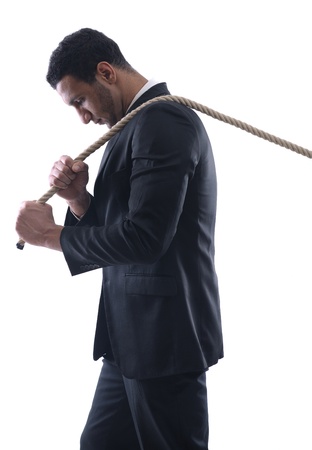 Business man with rope isolated on white backgroundの写真素材