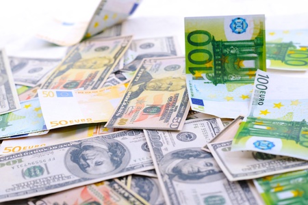 Business money background with us dollars and european euroの写真素材