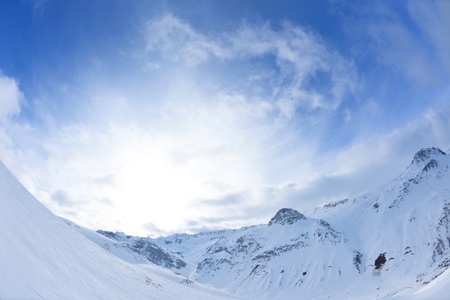 High mountains under fresh snow in the winter  seasonの写真素材