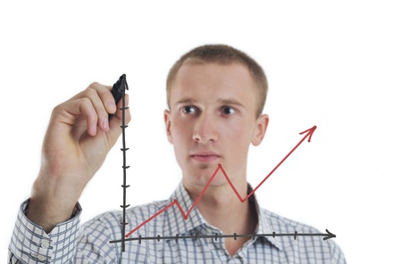 business man draw success line chart   isolated on white background  in studioの写真素材