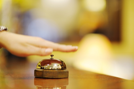 business woman  at the reception of a hotel checking inの写真素材