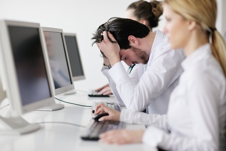 Portrait of a young business man looking depressed and worried from work at meeting office indorsの写真素材