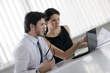 Group of happy young  business people in a meeting at officeの写真素材