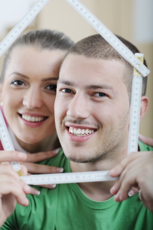 happy Young couple moving in new houseの写真素材