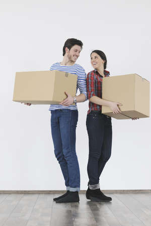 happy Young couple moving in new home
