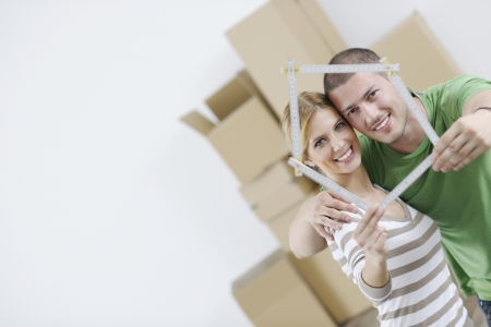 happy Young couple moving in new homeの写真素材