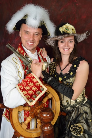 retro happy young couple people in victorian fashion clothesの写真素材