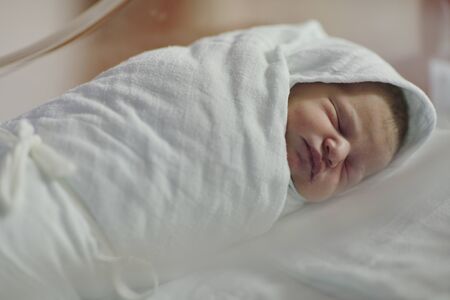 cute healthy new born baby portrait in hospitalの写真素材