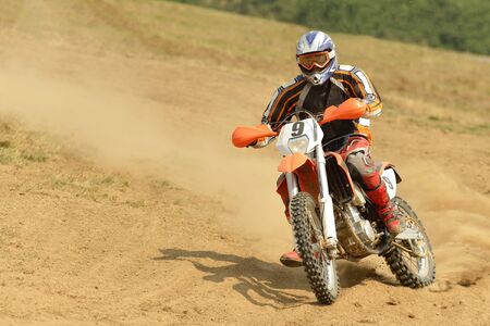 motocross bike in a race representing concept of speed and power in extreme man sportのeditorial素材