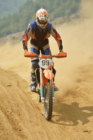 motocross bike in a race representing concept of speed and power in extreme man sportのeditorial素材