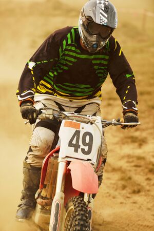 motocross bike in a race representing concept of speed and power in extreme man sportのeditorial素材