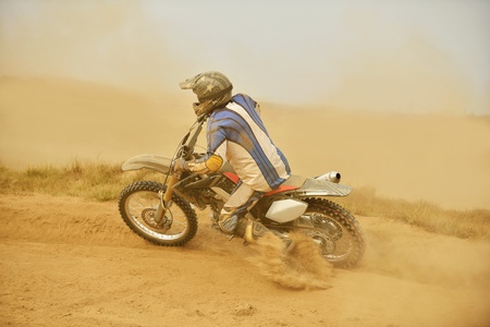 motocross bike in a race representing concept of speed and power in extreme man sportの写真素材