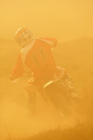 motocross bike in a race representing concept of speed and power in extreme man sportの写真素材
