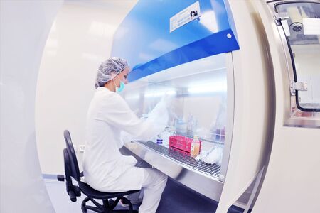 group of scientists working at the laboratory