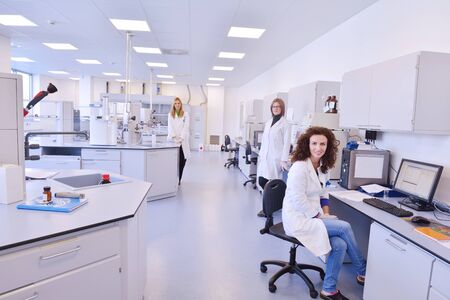 group of scientists working at the laboratoryの写真素材
