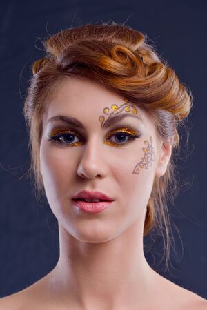Fashion Beauty. Beautiful Woman With hairsyle  and Luxury Makeup. Beautiful Girl Faceの写真素材