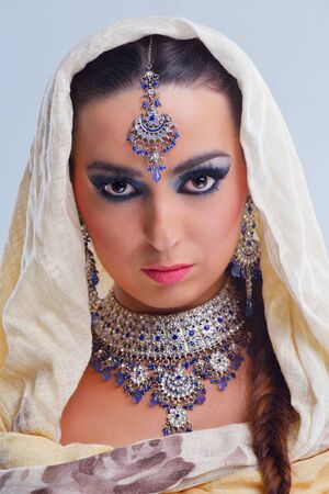 Fashion Beauty. Beautiful Woman With hairsyle  and Luxury Makeup. Beautiful Girl Face