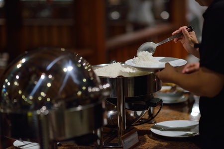 catering buffet food indoor in luxury restaurant with meat colorful fruits  and vegetablesの写真素材