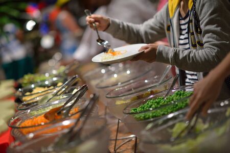 catering buffet food indoor in luxury restaurant with meat colorful fruits  and vegetables