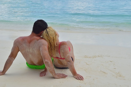 happy young  couple at summer vacation have fun and relax at beautiful sunny  dayの写真素材