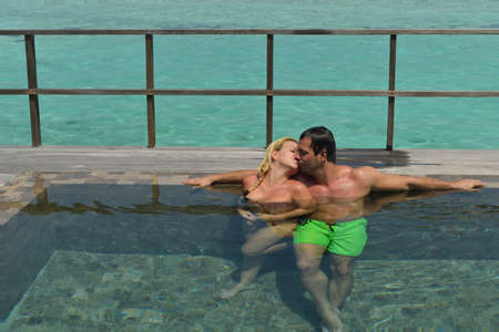 happy young  couple at summer vacation have fun and relax at beautiful sunny  dayの写真素材