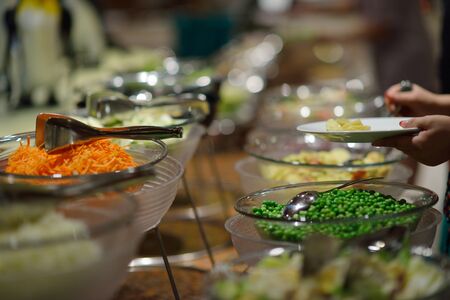 catering buffet food indoor in luxury restaurant with meat colorful fruits  and vegetables