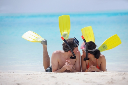 happy young romantic couple in love have fun running and relaxing on beautiful beachの写真素材