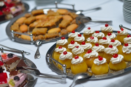 people group catering buffet food indoor in luxury restaurant with meat colorful fruits  and...