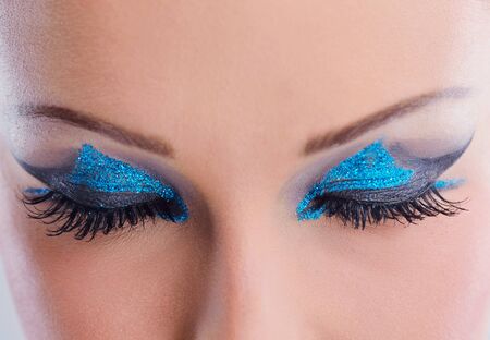 Fashion Beauty. Beautiful Woman With hairsyle  and Luxury Makeup isolated on white background in studio. Beautiful Girl Faceの写真素材