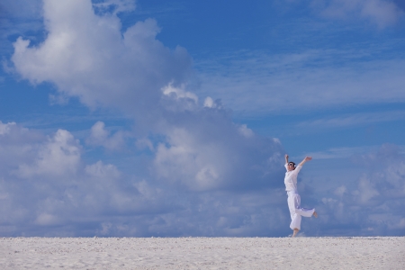 happy young woman on summer vacation on beautiful tropical beach have fun and relaxの写真素材