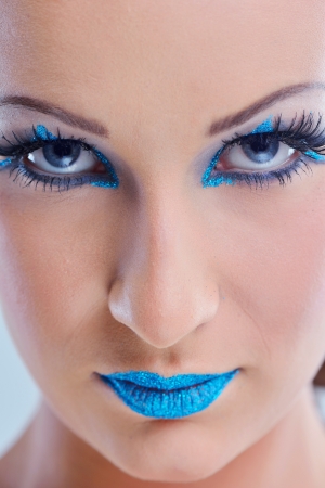 Fashion Beauty. Beautiful Woman With hairsyle  and Luxury Makeup isolated on white background in studio. Beautiful Girl Faceの写真素材