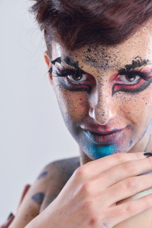 Fashion Beauty. Beautiful Woman With hairsyle  and Luxury Makeup isolated on white background in studio. Beautiful Girl Faceの写真素材