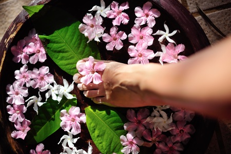 Closeup photo of a woman feet at spa salon on pedicure procedure. Legs care conceptの写真素材