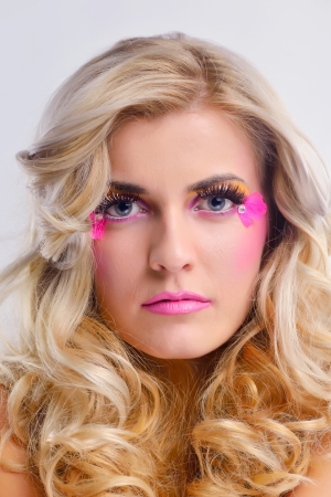 Fashion Beauty. Beautiful Woman With hairsyle  and Luxury Makeup isolated on white background in studio. Beautiful Girl Faceの写真素材