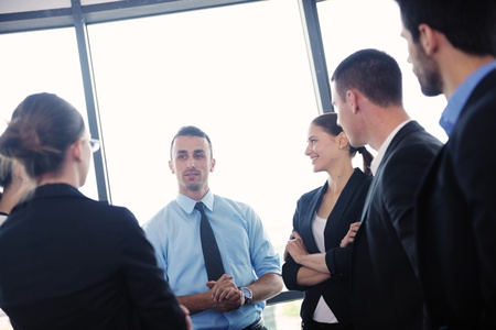 Group of happy young  business people in a meeting at officeの写真素材