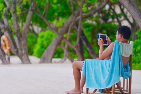 beautifel and happy woman girl on beach have fun and relax on summer vacation  over the beautiful tropical seaの写真素材