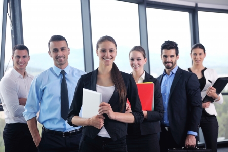 Group of happy young  business people in a meeting at officeの写真素材