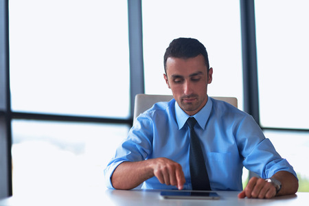 Group of happy young  business people in a meeting at officeの写真素材