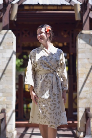 Woman getting spa treatment at tropical resortの写真素材