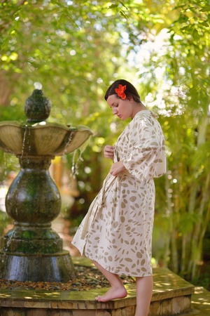 Woman getting spa treatment at tropical resortの写真素材