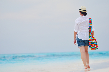 beautifel and happy woman girl on beach have fun and relax on summer vacation  over the beautiful tropical seaの写真素材