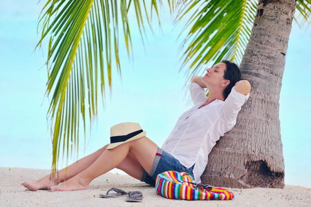 beautifel and happy woman girl on beach have fun and relax on summer vacation  over the beautiful...